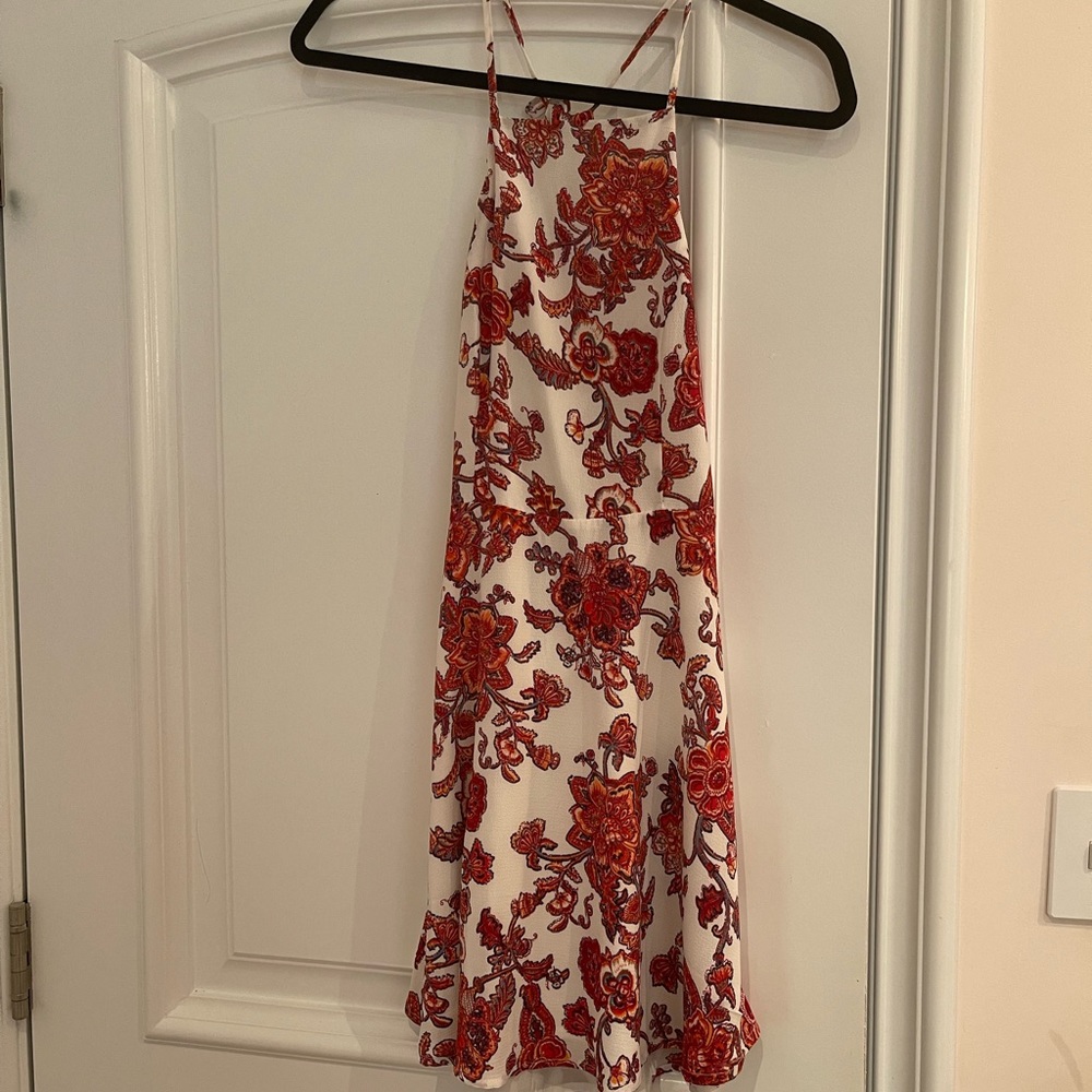 Forever 21 short mini dress with burgundy floral design. Open back